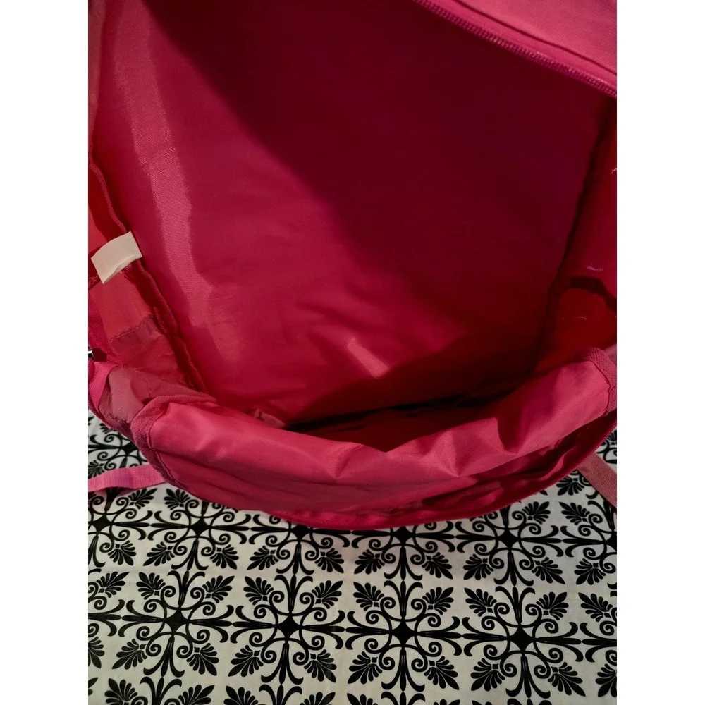 Bright pink sequin backpack. Gold Cat ears matching gold. Good. Few Minor Flaws.